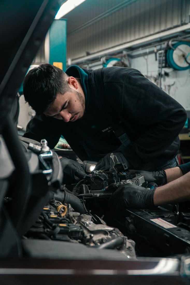 A mechanic working in an auto repair shop